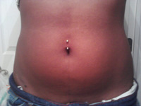 Mya's belly piercing